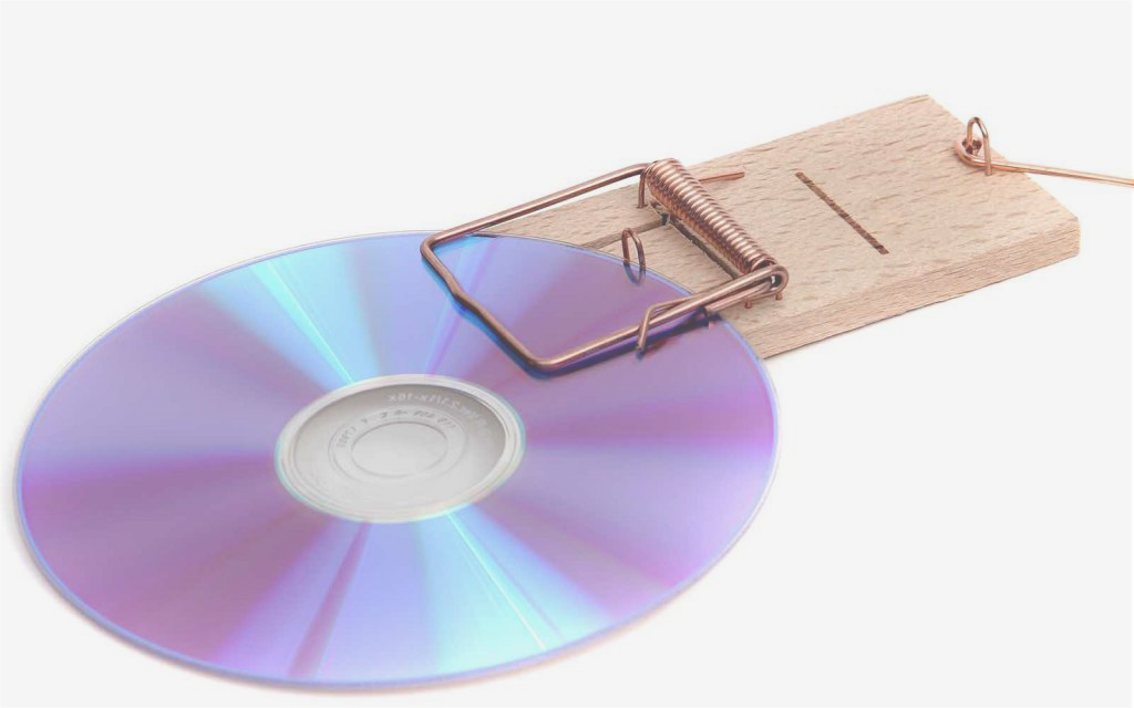 Optical data disc positioned beneath a mousetrap